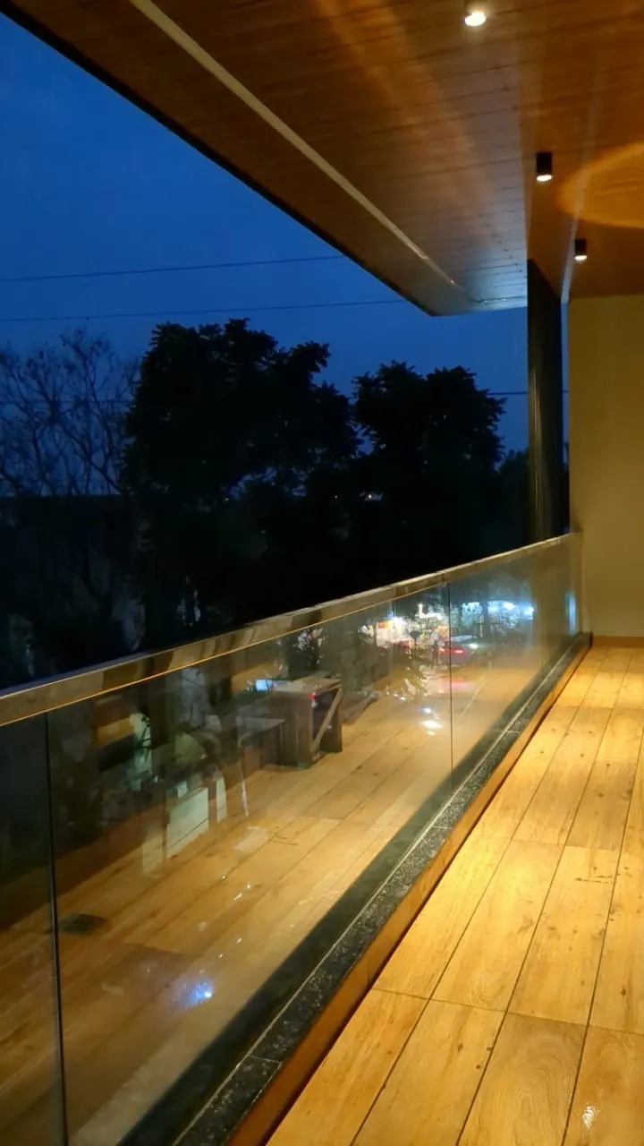 Balcony with warm timber ceiling and integrated lighting