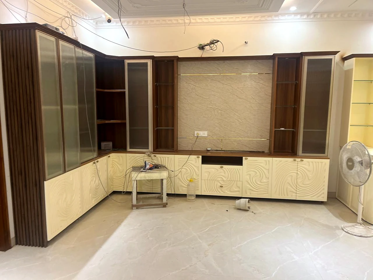 Second wide kitchen angle showing the corner counter and tall pantry