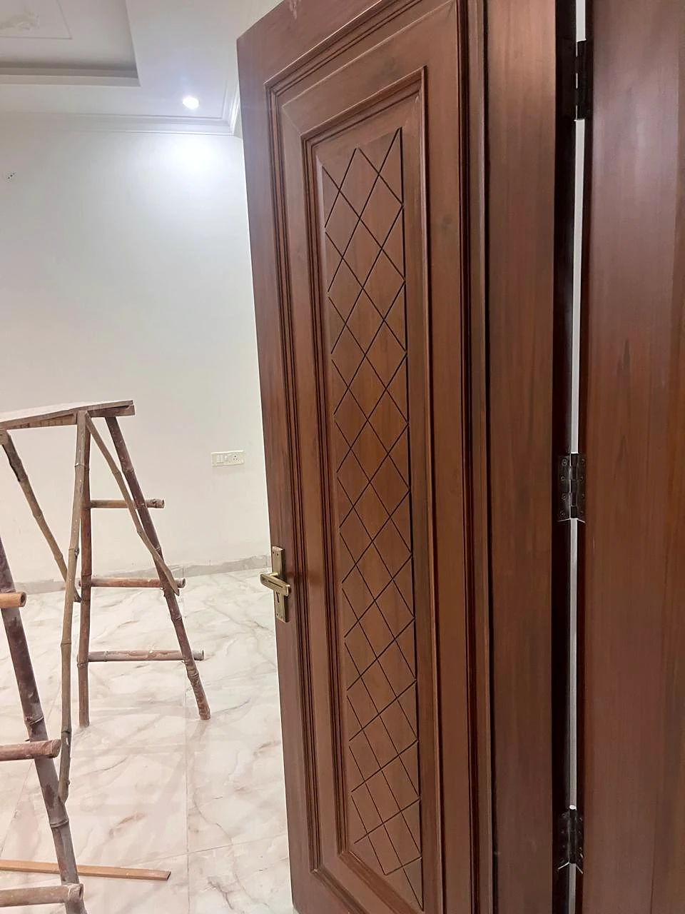 Timber bedroom door and adjacent passage detail