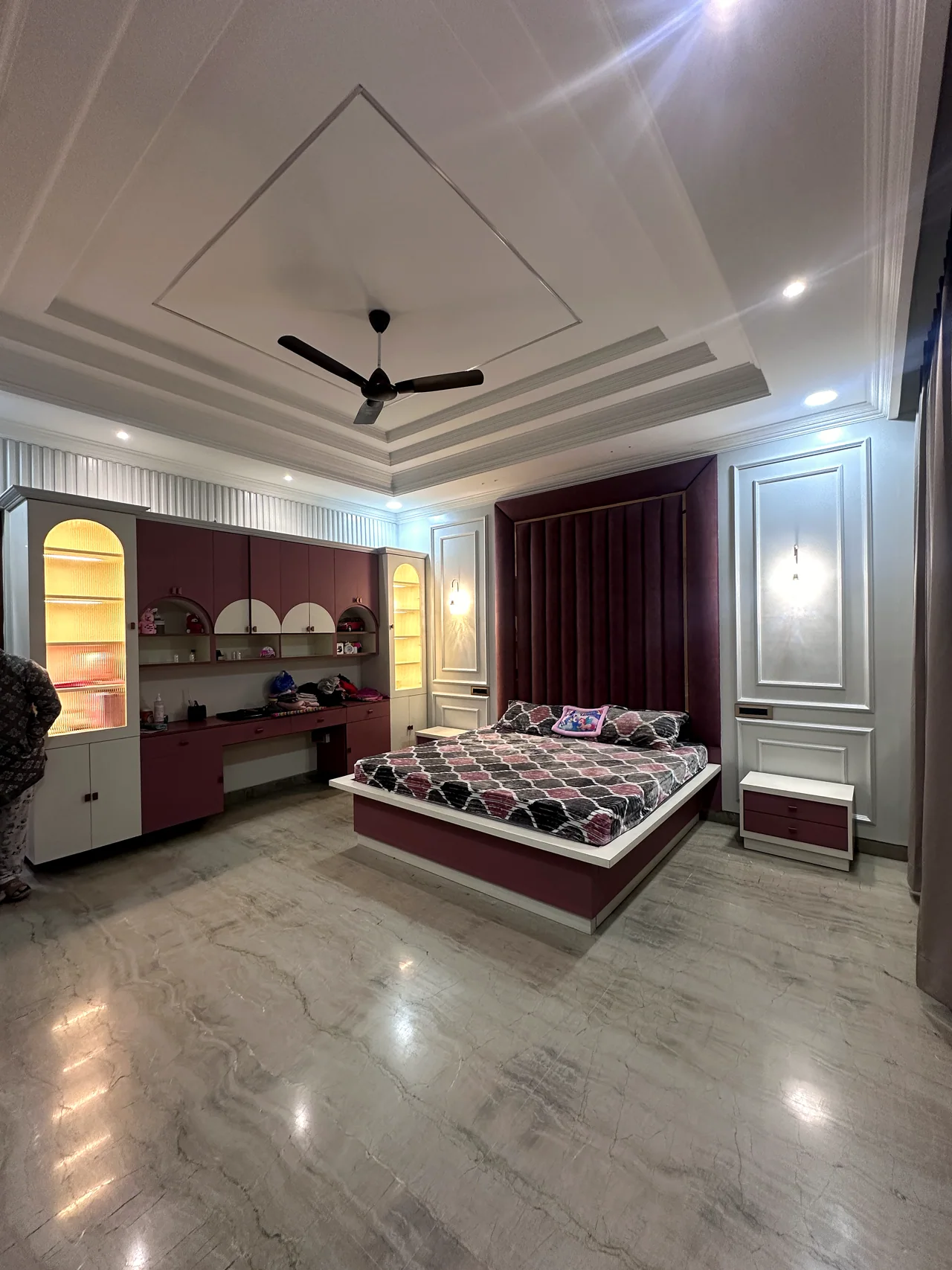Rose-toned bedroom and coordinated storage