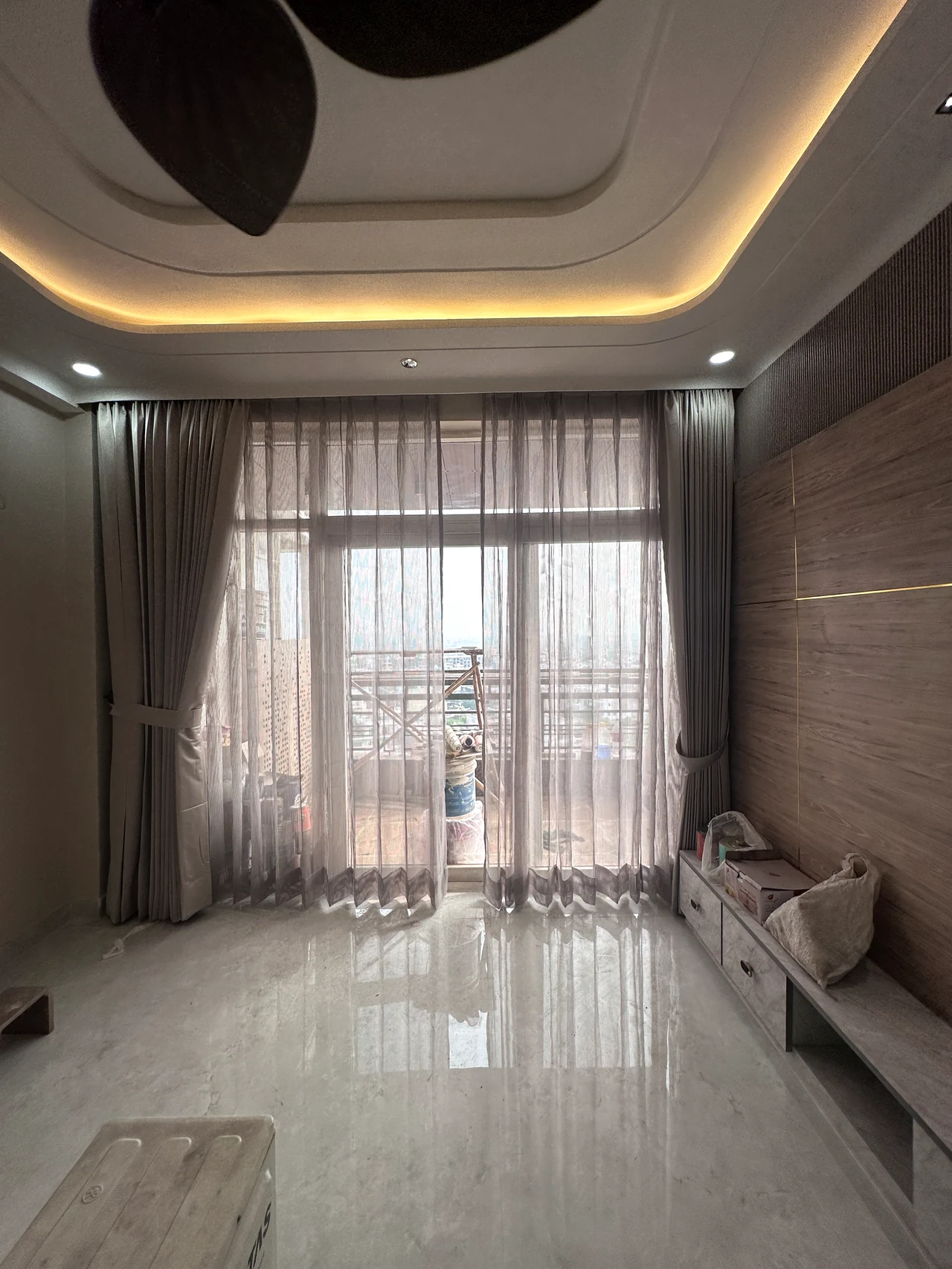 Bright living room looking towards the balcony doors